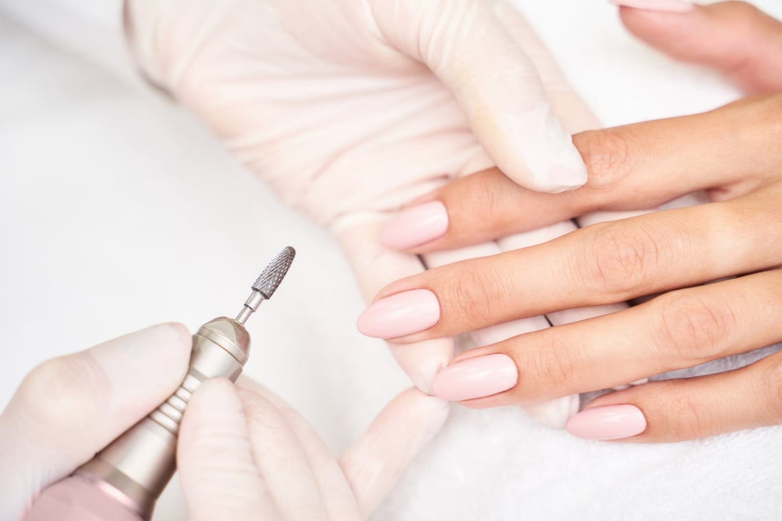 Woman Getting a Manicure          